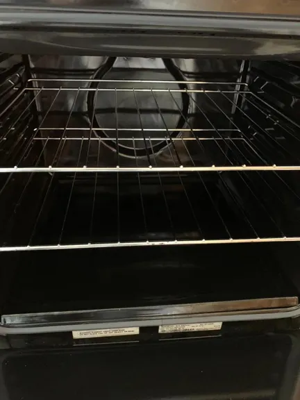 Laundry room after cleaning - clean appliances and organised space