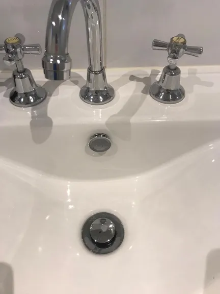 Kitchen after cleaning - spotless counters and gleaming appliances