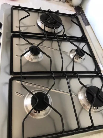 Bathroom after cleaning - pristine tiles and sparkling fixtures