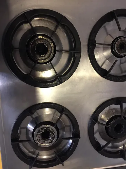 Kitchen after cleaning - spotless counters and gleaming appliances