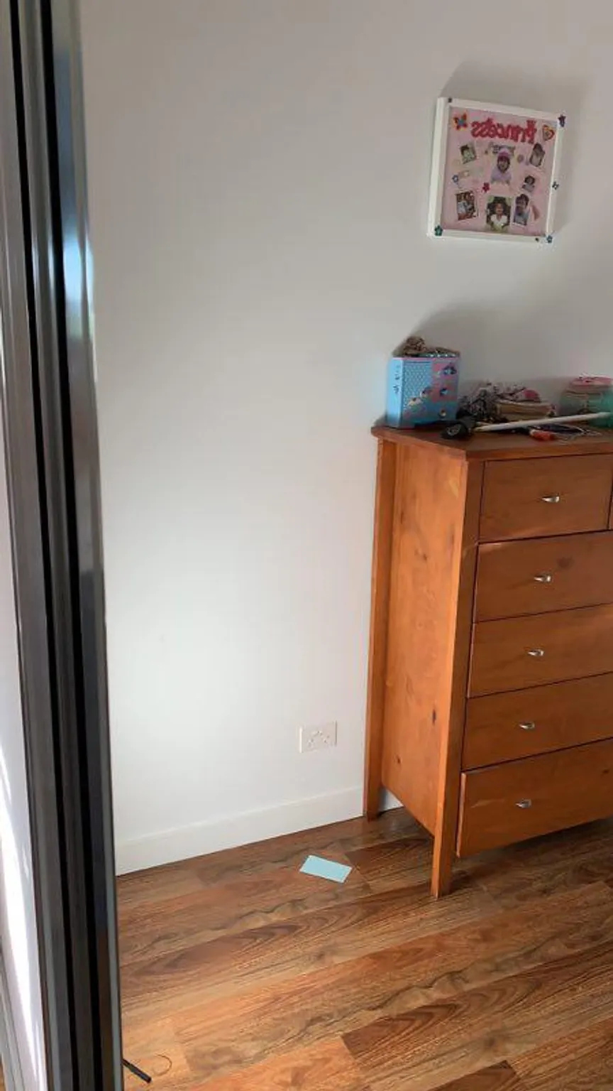 Beautifully cleaned living room with organised furniture