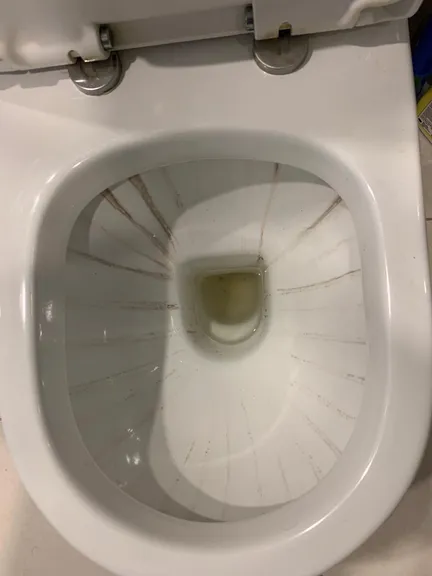 Living room before cleaning - messy historic features