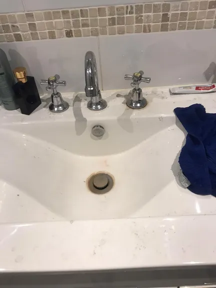 Kitchen before cleaning - dirty counters and appliances