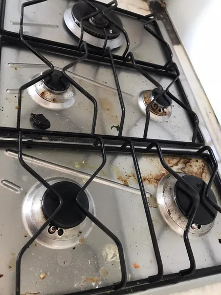 Bathroom before cleaning - stained tiles and fixtures