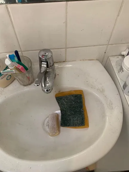 Living room before cleaning - messy beachfront apartment